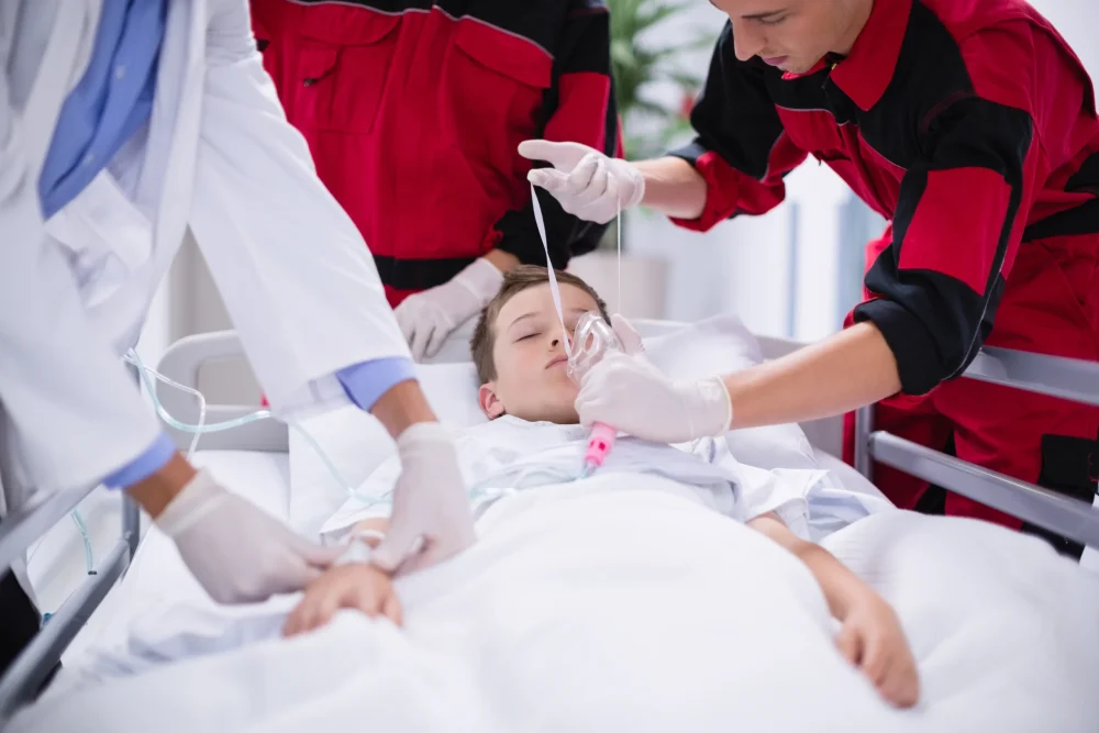 doctors-adjusting-oxygen-mask-while-rushing-patient-emergency-room