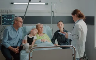 woman-doctor-discussing-about-treatment-medicine-with-patient-family-hospital-ward-child-mother-man-talking-medic-about-diagnosis-recovery-giving-support-ill-woman