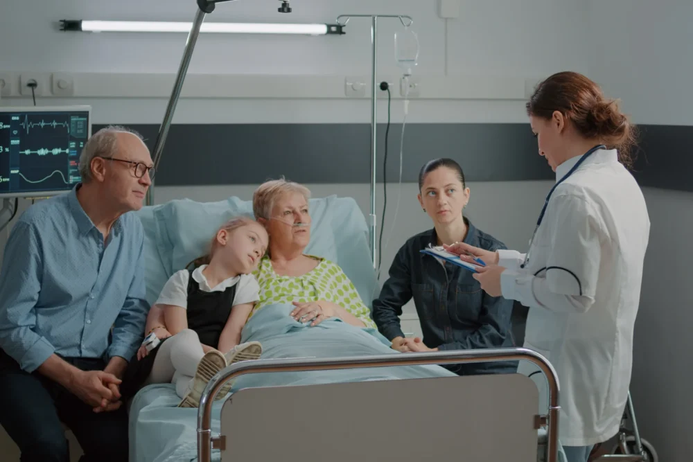 woman-doctor-discussing-about-treatment-medicine-with-patient-family-hospital-ward-child-mother-man-talking-medic-about-diagnosis-recovery-giving-support-ill-woman